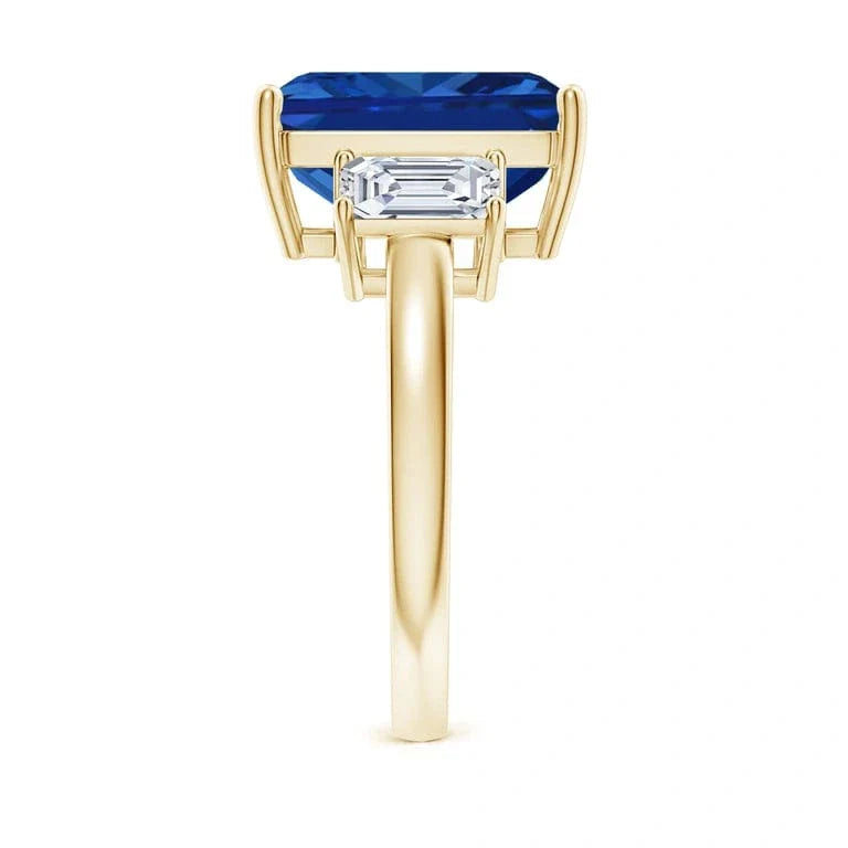 Emerald-Cut 5.5CT Royal Blue Lab-Grown Sapphire Engagement Ring – Three Stone Classic Design with Moissanite Side Stones, 14K Yellow Gold Plated on Tarnish-Resistant Silver(Includes GRC Certification from Gemstone Research Center)