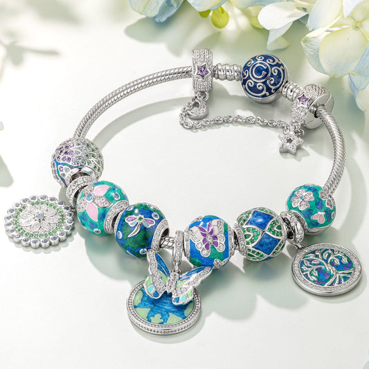 gona- Sterling Silver Emerald Flutter Charms Bracelet Set With Enamel In White Gold Plated (Includes bracelet and all charms shown)