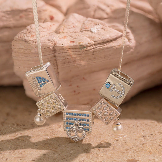 gona- Sterling Silver Oceanic Exploration Rectangular Charms Necklace Set In White Gold Plated