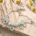 Sterling Silver Emerald Flourish Charms Bracelet Set In White Gold Plated (Includes bracelet and all charms shown)