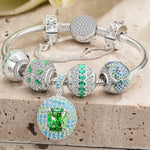 Sterling Silver Emerald Glow Charms Bracelet Set In White Gold Plated (Includes bracelet and all charms shown)