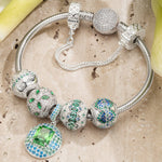 Sterling Silver Emerald Glow Charms Bracelet Set In White Gold Plated (Includes bracelet and all charms shown)